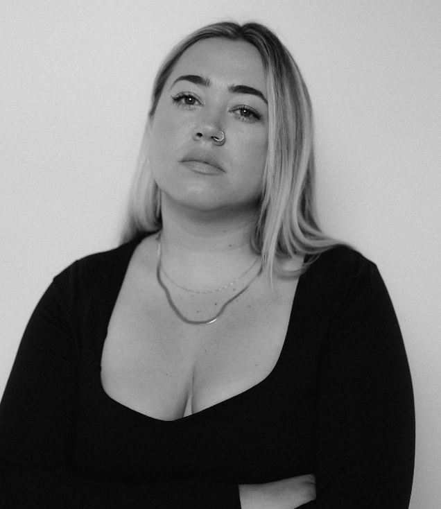 This is a headshot of Natalie Bergfolk, the guest expert for this Wild Womn Haus editorial titled “Brand Videography as a Marketing Secret Weapon”.